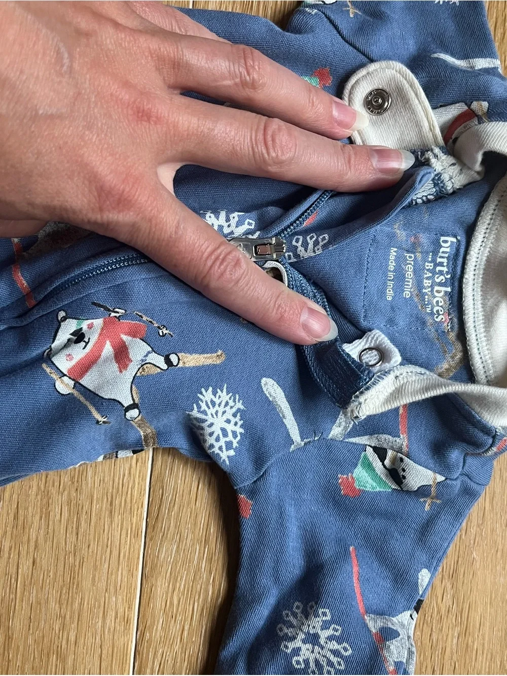 The cutest! Burt’s Bees Blue Snowman Ski Print Footed One-Piece for Babies